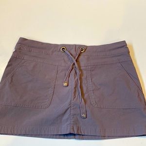 Prana Skort, sits on the hips and measures 12 inches long.